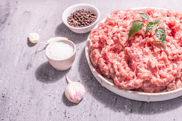 Raw pork minced meat in a ceramic stand