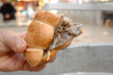 Palermo Sicily, Vucciria market street food. Pane ca meusa that is a sicilian traditional sandwich...