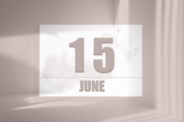 june 15. 15th day of the month, calendar date.White sheet of paper with numbers on minimalistic pink background with window shadows.Summer month, day of the year concept
