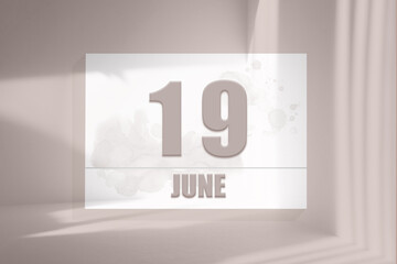 june 19. 19th day of the month, calendar date.White sheet of paper with numbers on minimalistic pink background with window shadows.Summer month, day of the year concept