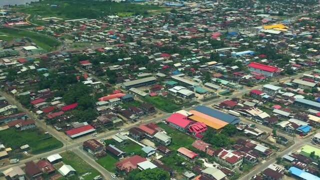 Aerial views from small airplane of Paramaribo&rsquo;s residential neighborhoods