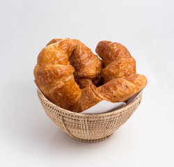 3 croissants on a basket