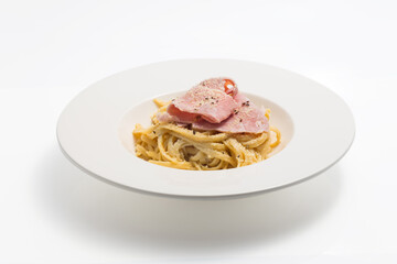 Spaghetti Carbonara with Ham, white background

