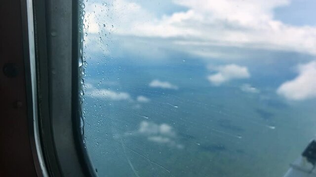 Water drops on airplane window