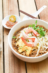Bowl of Sarawak Laksa, a polular local dish in Sarawak, Malaysia