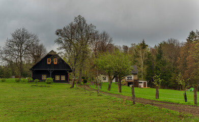 Meadows and forests near Vizovice town after big rain with cloudy sky