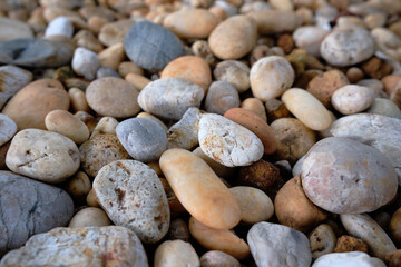 Fototapeta na wymiar pebble stones with different size and color nature background
