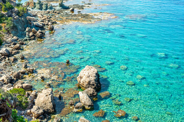 View to the Cyprus island sea coast with blue water and mountain. Akamas cape landscape