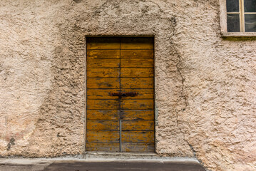 Old door of a farmhouse in Valposchiavo
