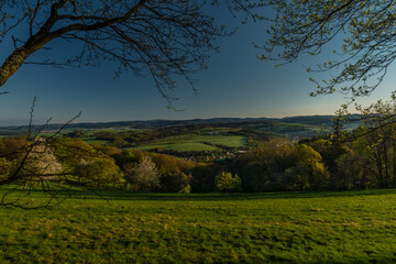 Meadows over Vizovice town with sunrise and fresh color air in east Moravia
