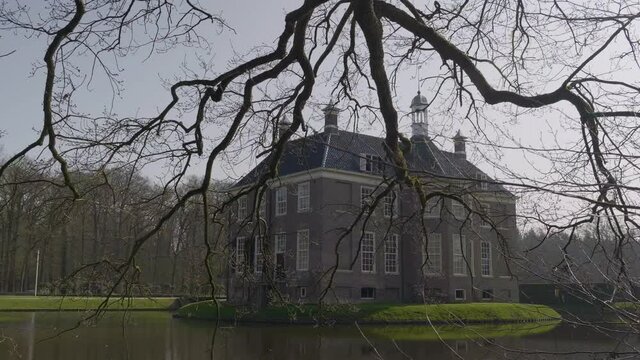 Den Berg manor house on water, historical architecture of Netherlands