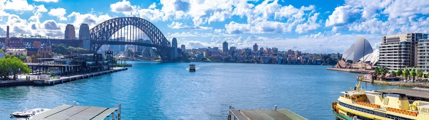 Fototapeten Panorama view of Sydney Harbour and buildings bridges ferries. Picture taken from Cahill Expressway Circular Quay NSW Australia © Elias Bitar
