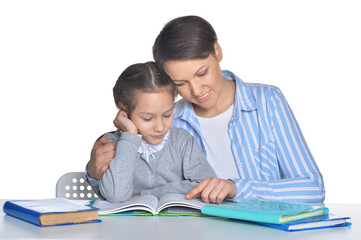 Fototapeta na wymiar mother with daughter doing homework