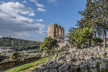 Fototapeta premium Top view of Greek ruins of Odeon of Herodes Atticus (161AD) - stone Roman theater at the Acropolis hill. Athens, Greece.