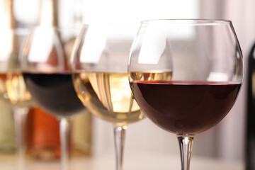 Different sorts of wine in glasses, closeup