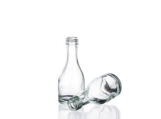 Empty glass bottle on white background