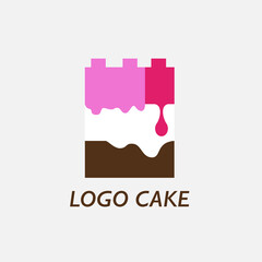 colorful cake assembled in layers like blocks, dripping drop of caramel