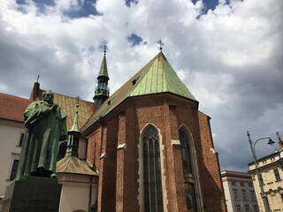 The Church of St. Francis of Assisi with Monastery of the Franciscan Order located in the Old Town district of Kraków, is a Roman Catholic religious complex on the west side of All Saints Square - obrazy, fototapety, plakaty