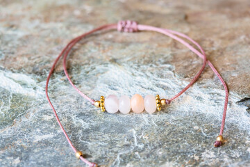 Morganite cubic cut mineral stone bead bracelet on natural background
