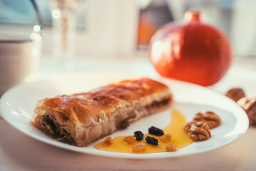 Pumpkine pie with honey and raisins and walnuts, tasty breakfast