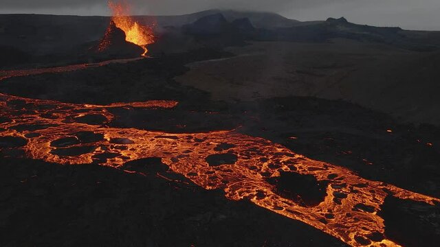 Erupting volcano near Fagradalsfjall, Iceland. Aerial forward
