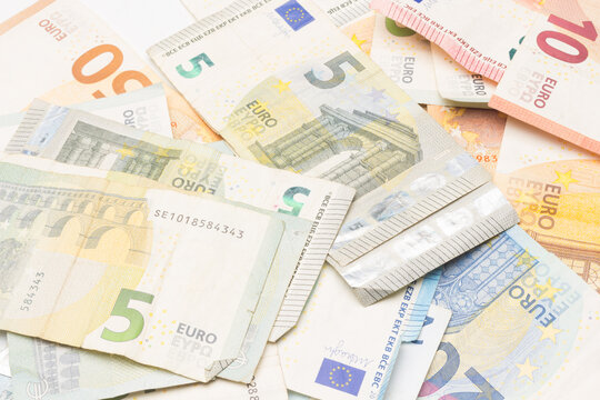 Money in coins and Euro banknotes, official currency of Europe