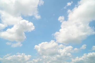 Bright blue sky with fluffy white clouds, The idea for the feeling of fresh weather, Bright blue sky with fluffy white clouds, Clean on a hot sammer day. Fresh blue sky and soft white clouds.