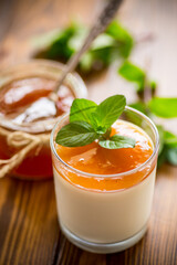 homemade yogurt in a glass and with jam
