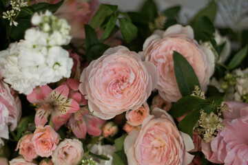 Close up of pink peony in fresh flowers arrangements.