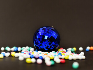 Celebration. multicolored thermocol ball and large reflective balls.