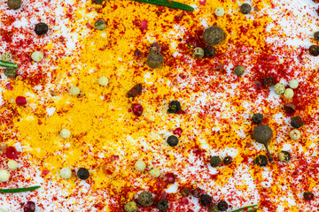 Obraz na płótnie Canvas Scattered spices, allspice as a background.
