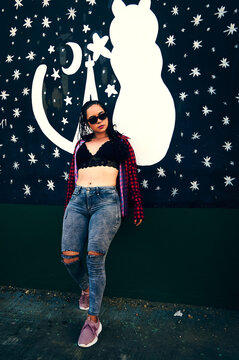 LATIN GIRL WALKS HER NEIGHBORHOOD WITH A LOT OF STYLE
