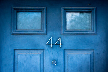 House door number 44 - obrazy, fototapety, plakaty