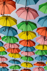 multi-color umbrella display hanging high over a street in Jerusalem, Israel