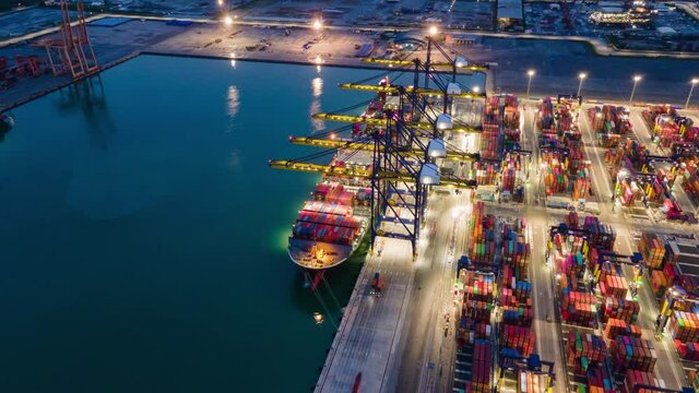 วิดีโอสต็อก

Time lapse Container , container ship in export and import business and logistics. Shipping cargo to harbor by crane. Water transport International. Aerial view and top view.