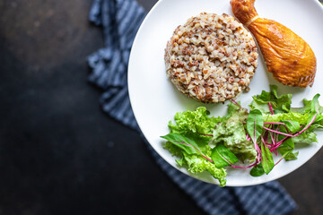 buckwheat chicken leg salad porridge leaves green lettuce mix fresh healthy appetizer diet meal snack copy space food background rustic. top view keto or paleo diet