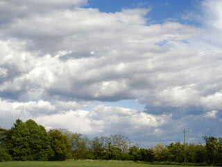 Sky with clouds and field