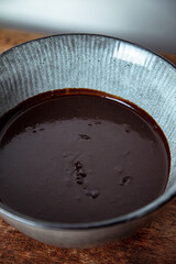 Bowl of raw and vegan chocolate dough