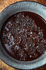 Bowl of raw and vegan chocolate dough