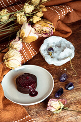 Vegan and gluten free chocolate lava cake with raspberries jam