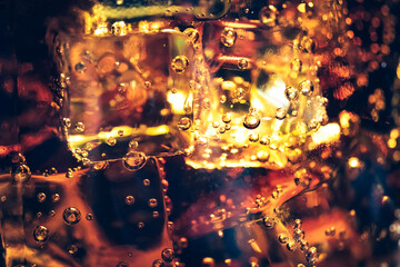 Refreshing Bubbly Soda Pop with Ice Cubes. Cold soda iced drink in a glasses - Selective focus, shallow DOF	
