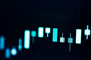 Financial data of stock market in term of a digital prices on LED display. A number of daily market price and quotation of prices chart to represent candle stick tracking in Forex trading.