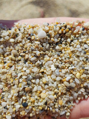The coastline of Cleopatra Beach. Sea sand in the form of small crushed pebbles. Alanya, Turkey