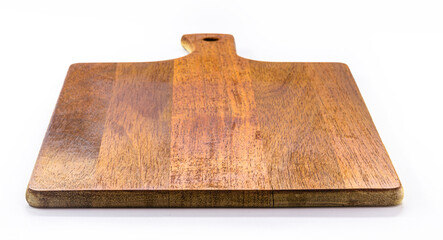 Kitchen utensils, vintage wooden chopping board, isolated white background