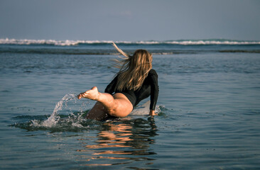 girl surf the ocean sunset vacation sport