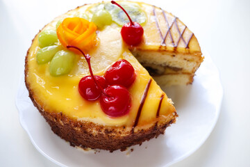 sweet dessert. sponge cake decorated with fruit and jelly 