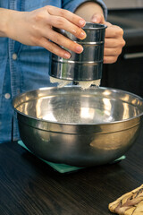 woman cooking with flour