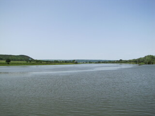 Embankment of the Dniester River. Sandy beach. A great place to relax with the whole family.
