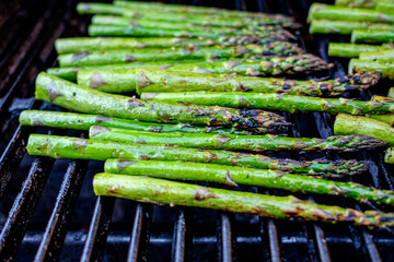 Fresh asparagus being grilled