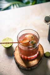 pink elderberry mocktail in a glass
